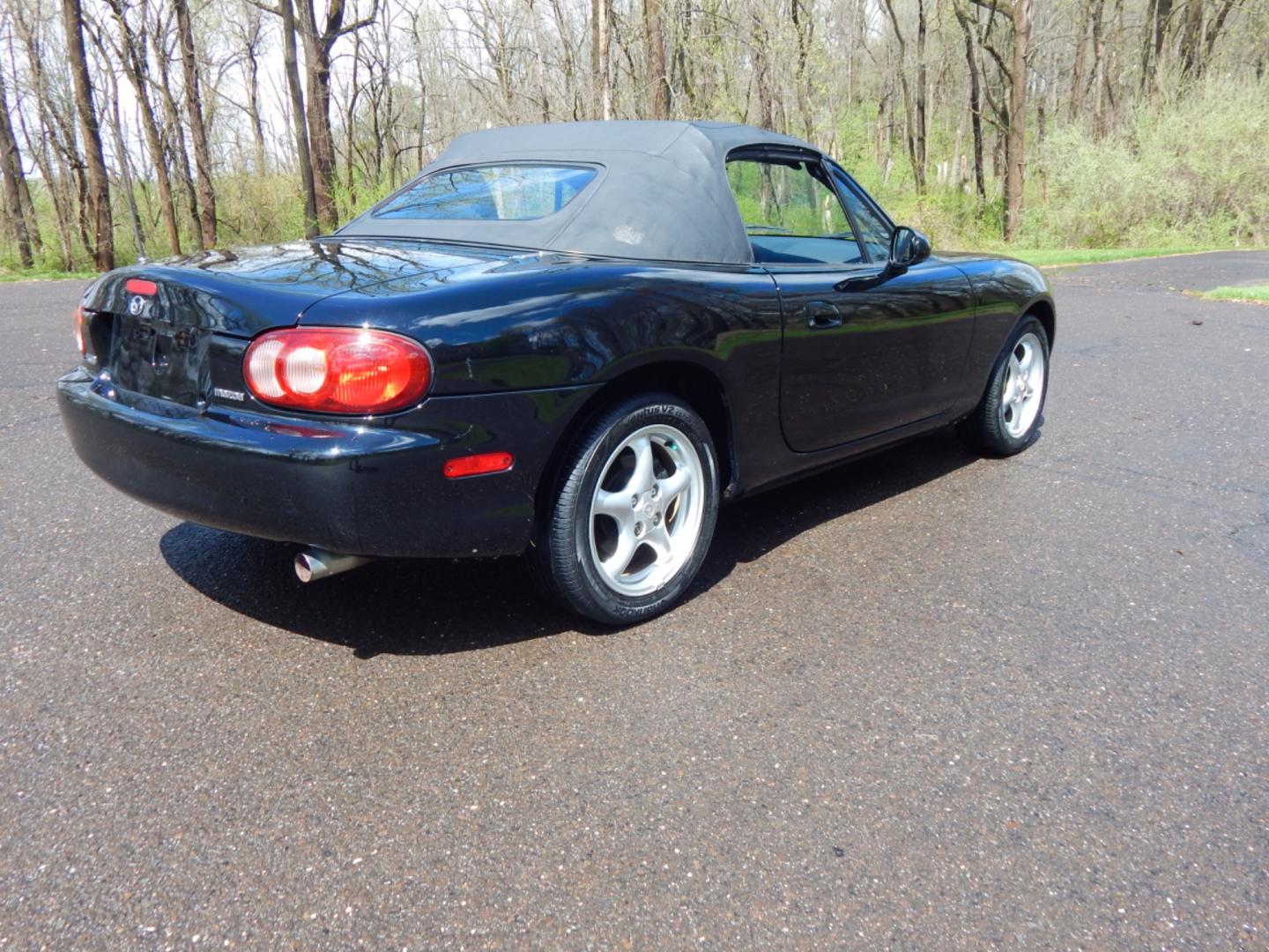 2002 Black /Black Cloth Mazda MX-5 Miata base (JM1NB353920) with an 1.8 liter 4 cylinder engine, 5 speed manual transmission, located at 6528 Lower York Road, New Hope, PA, 18938, (215) 862-9555, 40.358707, -74.977882 - Here for sale is a very fun 2002 Mazda MX-5 Miata. Under the hood is a strong running 1.8 liter 4 cylinder which puts power to the rear wheels via a solid shifting 5 speed manual transmission. Features include; Black cloth interior, wood grain trim, cold AC, power windows, AM/FM/CD, heated rear wi - Photo#8